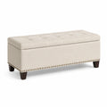Banc de rangement en tissu beige avec pieds en bois