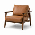 Fauteuil en cuir avec cadre en bois